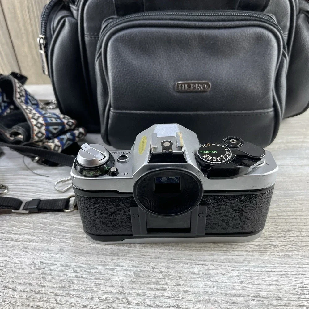 Canon AE-1 35mm SLR Film Camera w/ 50mm f/1.4 FD Lens